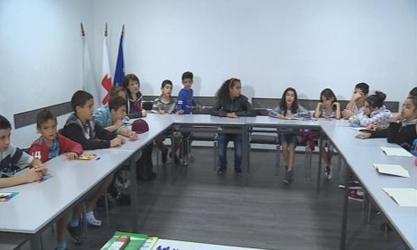 Деца бежанци на уроци по български